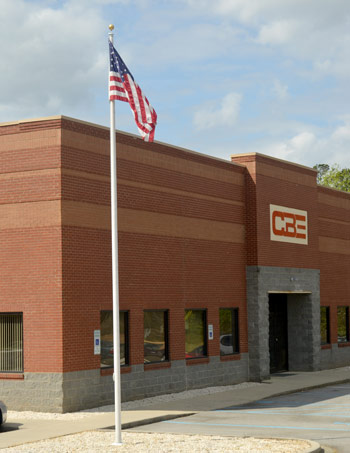 CBE Headquarters with flagpole out front flying the American Flag